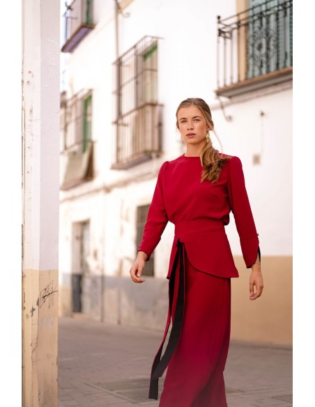 Dark red top with black cuffs and button