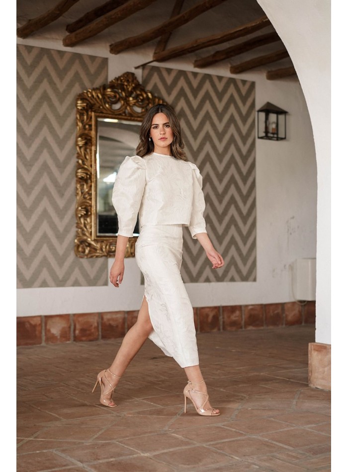 Falda midi brocada en color crudo