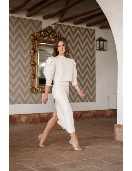 Falda midi brocada en color crudo