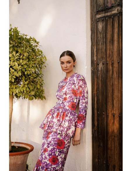 Vestido largo con cintura péplum y bajo con volante para ocasiones especiales