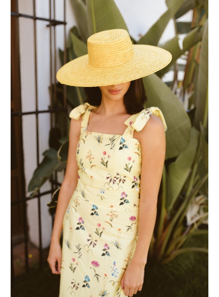Top amarillo con estampado floral y lazadas para ocasiones especiales