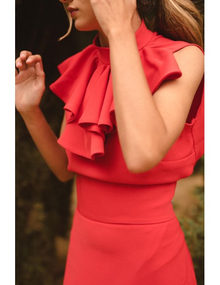 Red sleeveless top with ruffled collar