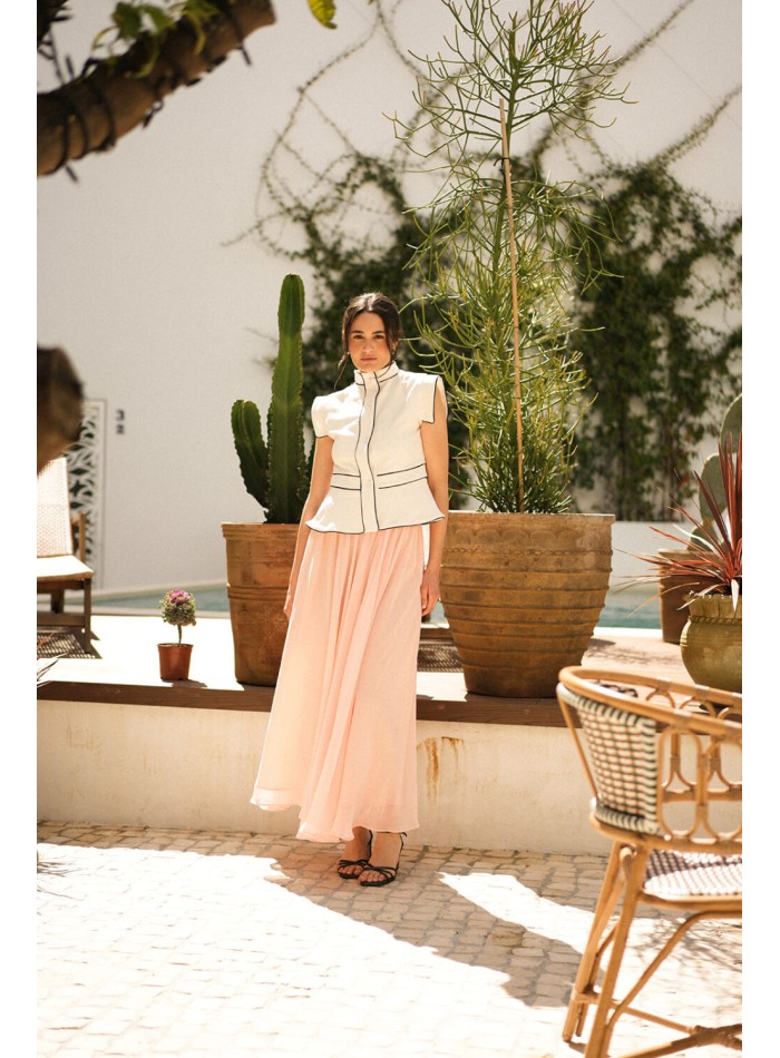 Chaleco en crudo con vivos negros