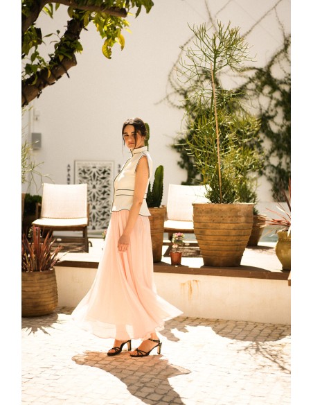 Chaleco en crudo con vivos negros