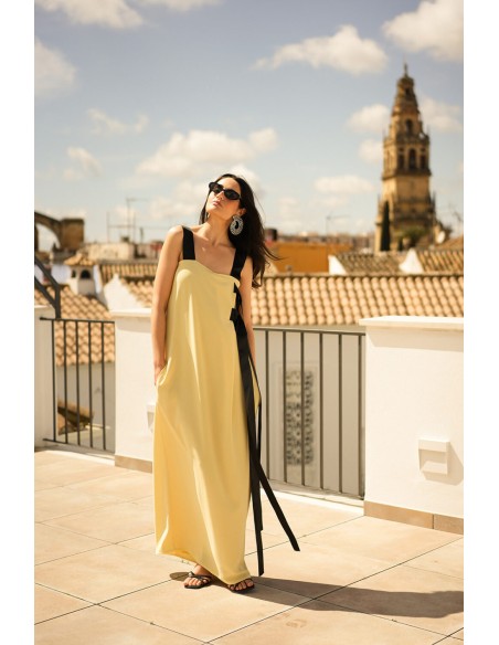 Long yellow dress with black bows