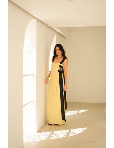 Long yellow dress with black bows