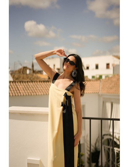 Long yellow dress with black bows