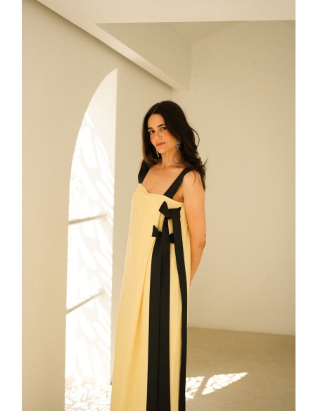 Long yellow dress with black bows