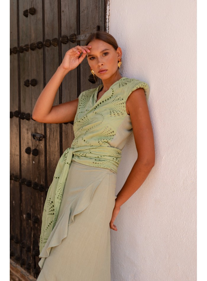 Green linen guest ensemble with wrap skirt