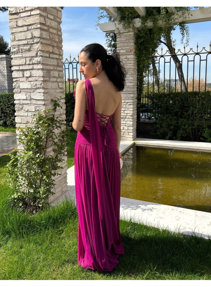 Long gown with draped bodice and cape sleeves