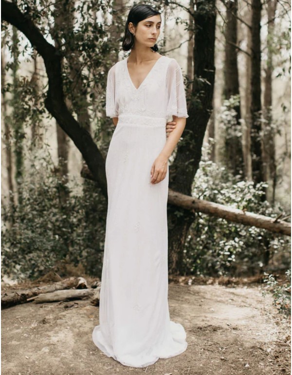 Long white dress with short flowing sleeves