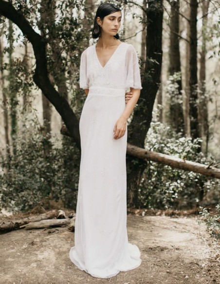 Long white dress with short flowing sleeves