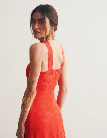 Long red jacquard dress with halter neckline