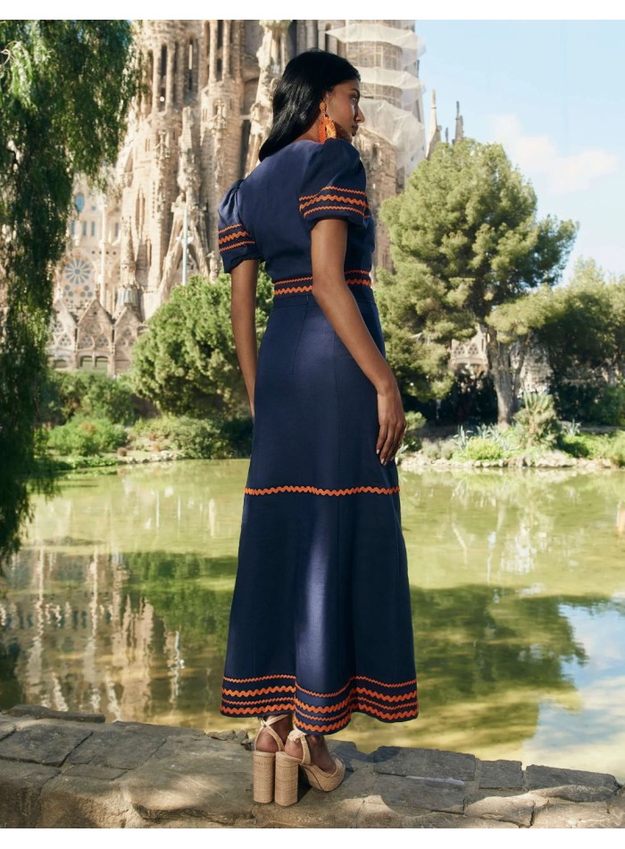 Top para invitada de lino con mangas abullonadas con detalles naranjas