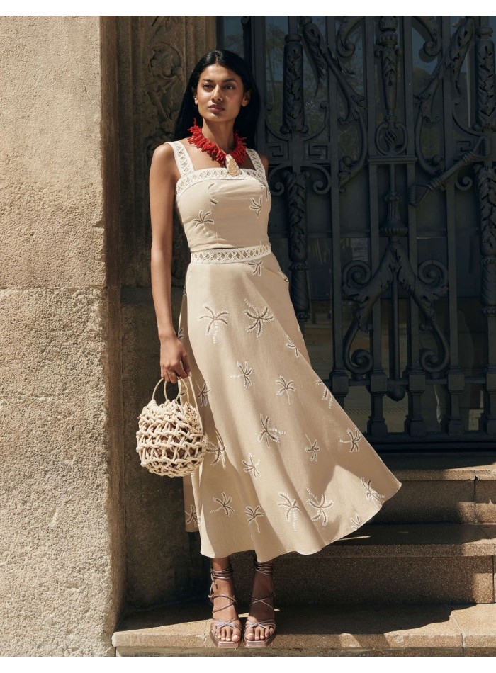 Falda midi de fiesta beige estampada con vuelo