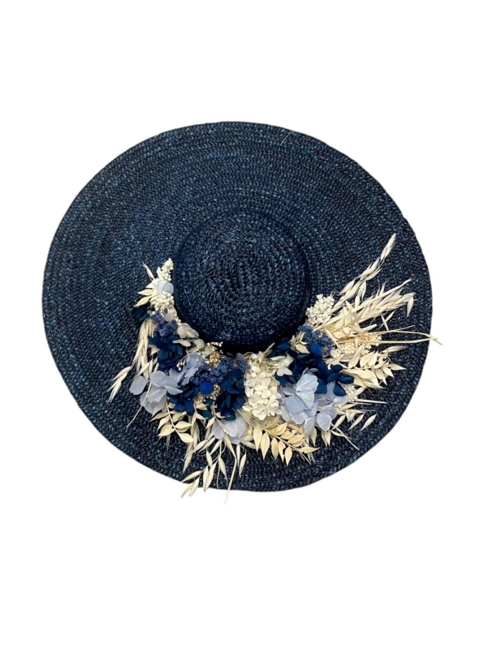 Navy straw pamela with floral decoration of preserved flower