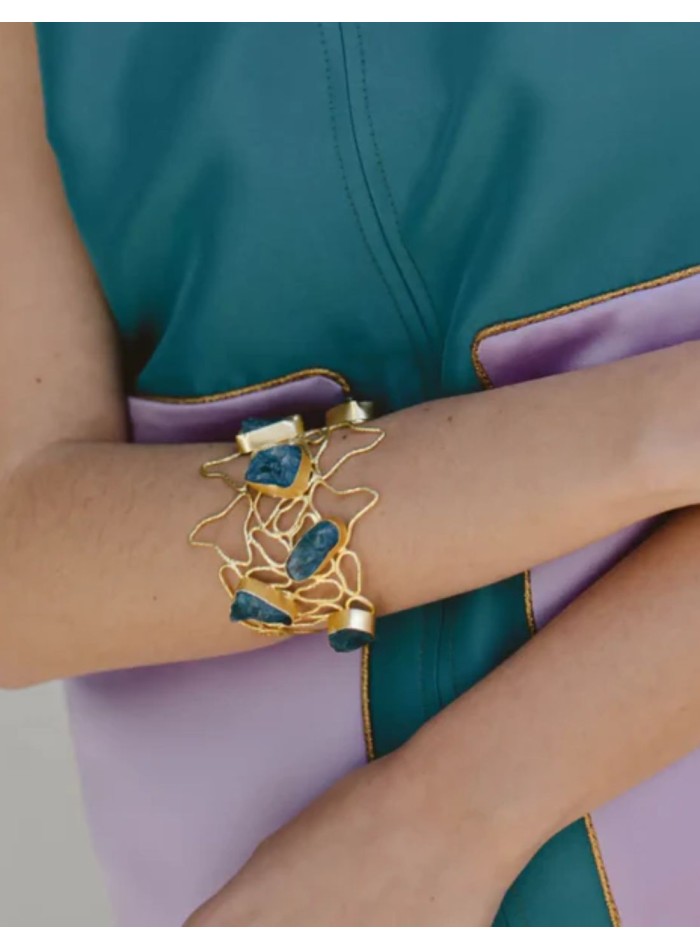 Golden bracelet with colored stones