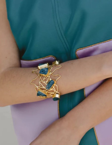Golden bracelet with colored stones