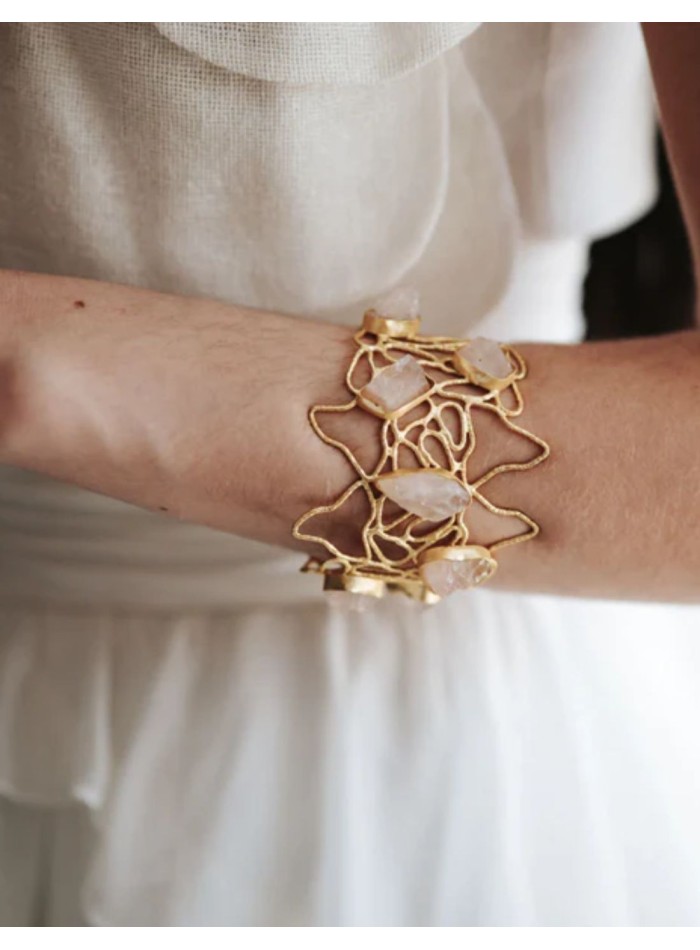 Golden bracelet with colored stones