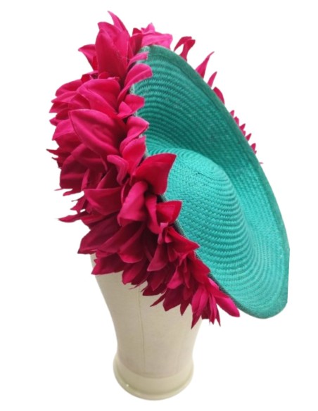 Turquoise guest headdress with fuchsia petals