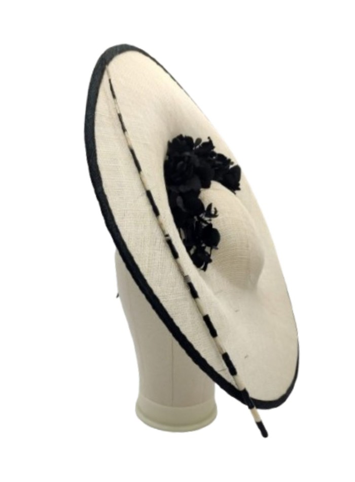 Headdress with sinamay base decorated with preserved hydrangea branches