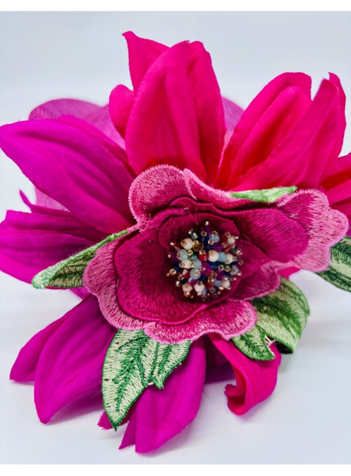 Fuchsia sinamay guest headpiece with flowers