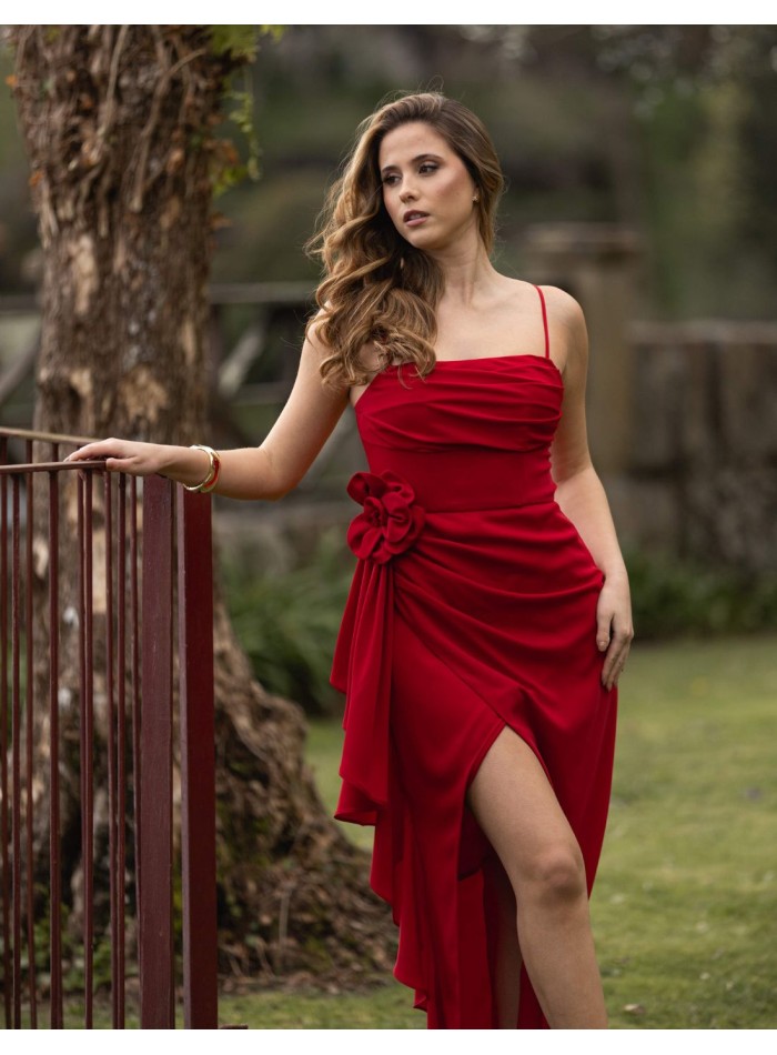 Long red party dress with ruffles and flower...