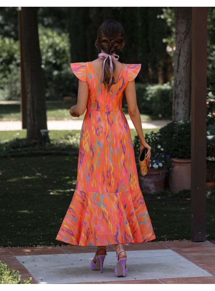 Vestido de invitada midi en lino estampado en naranja para bautizos
