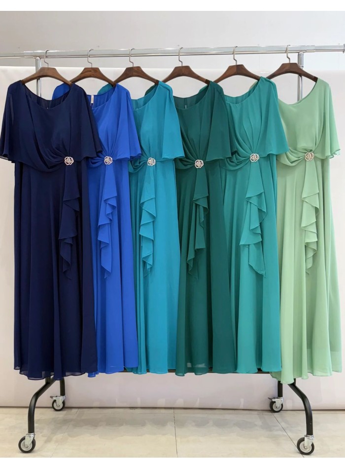Long guest dress with brooch and cape