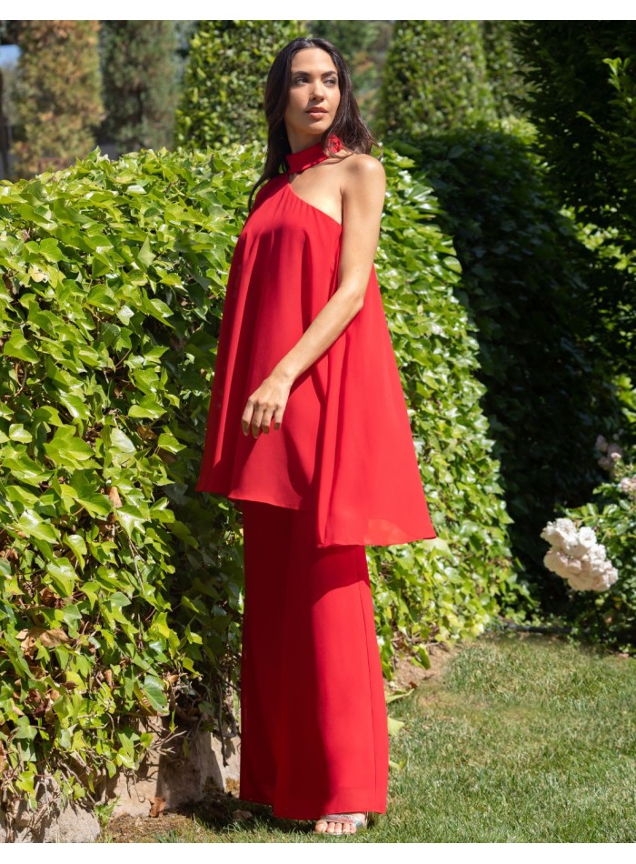 Long flowing guest jumpsuit with asymmetrical neckline