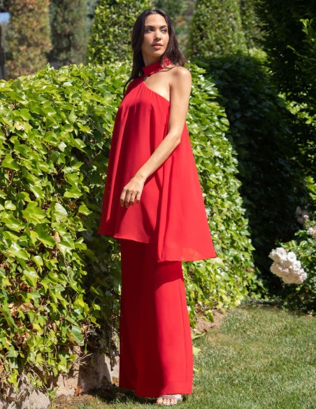 Long flowing guest jumpsuit with asymmetrical neckline
