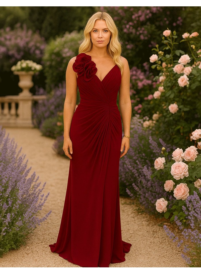 Long gown with V-neckline and flower detail on the strap