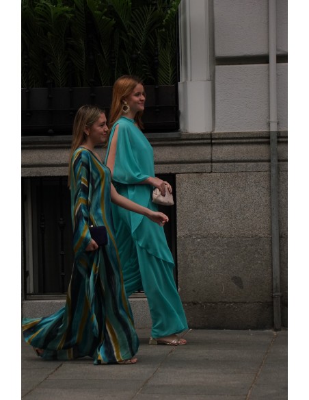 Mono para invitada en gasa con una manga y lazada al cuello