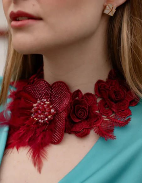 Necklace with burgundy embroidered flowers with feather details
