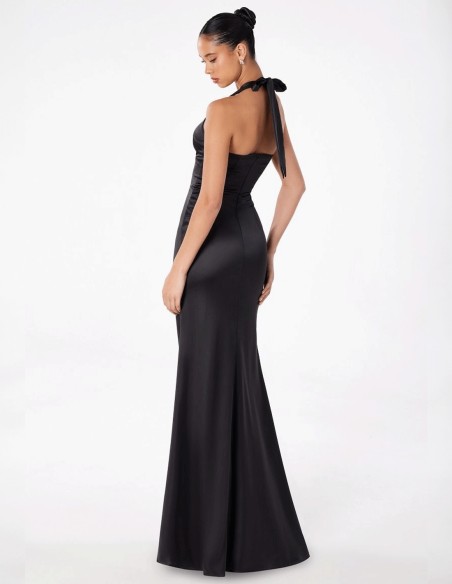 Long satin gown with halter neckline tied at the neck