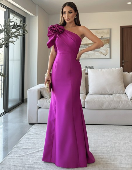 Long gown with asymmetrical neckline and shoulder embellishment