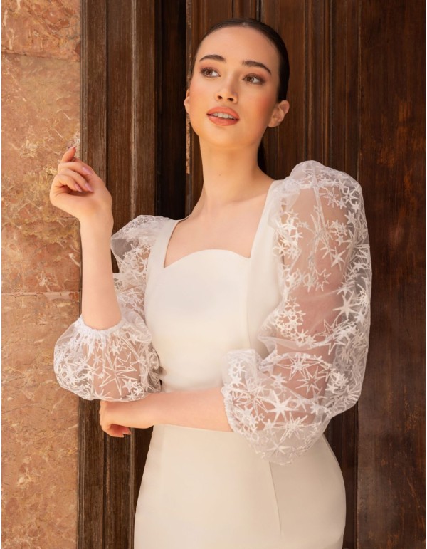 Vestido midi blanco con mangas abullonadas con bordados