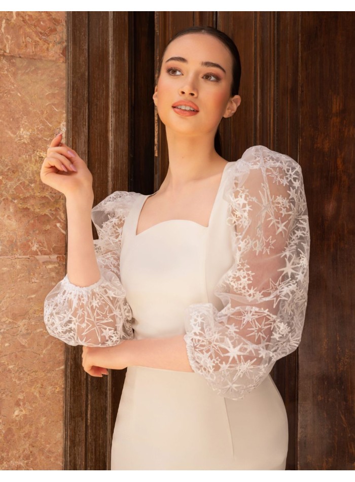 Robe midi blanche à manches bouffantes avec broderie
