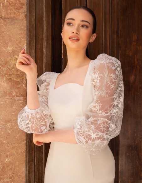 White midi dress with puffed sleeves and embroidery