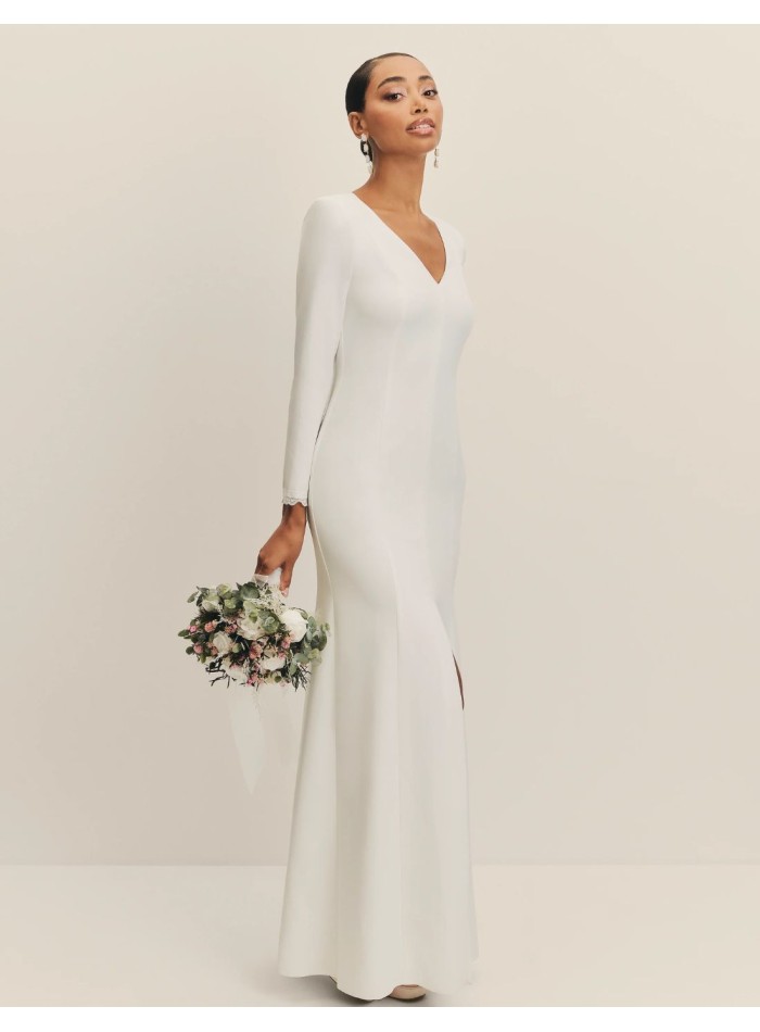 Long wedding dress with V-neckline and shoulder...