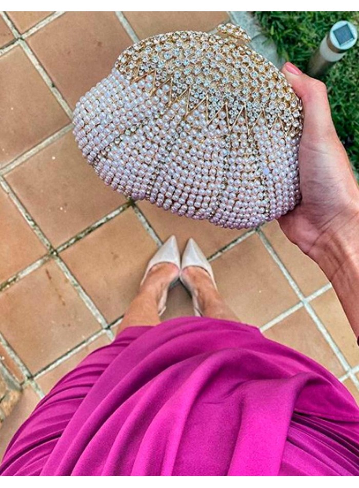 Shell-shaped party clutch with Swarovski crystals.