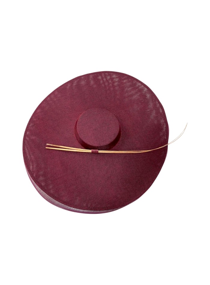 Maroon wedding hat with horsehair detail and handcrafted rachis