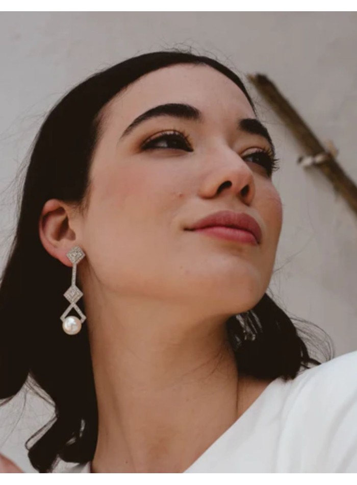 Sterling silver earrings in geometric shapes...