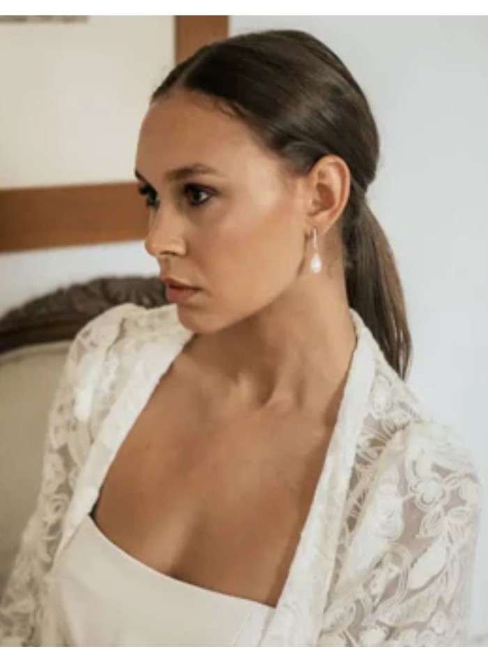 Long earrings with row of zirconia and pearls