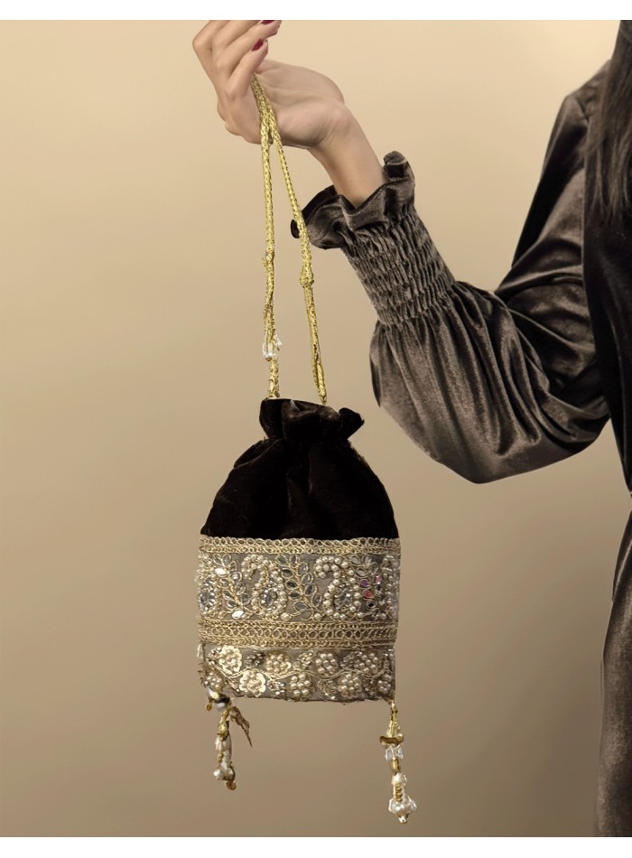 Brown velvet bonbonniere with pearl and...