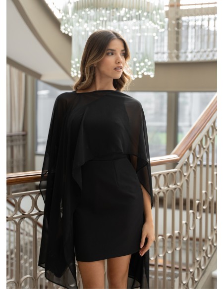 Short black party dress with asymmetrical neckline and cape