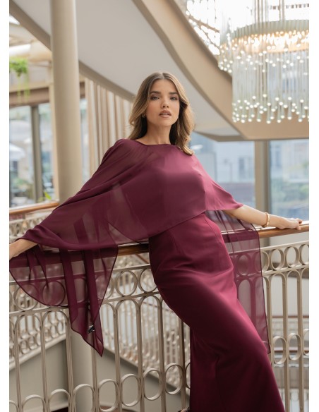 Midi dress with asymmetrical burgundy neckline and chiffon cape