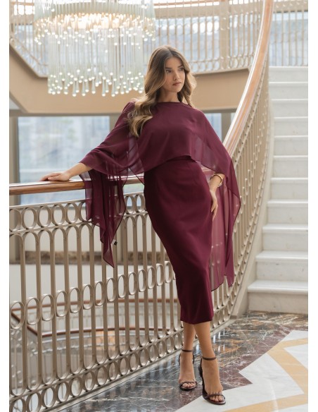 Midi dress with asymmetrical burgundy neckline and chiffon cape