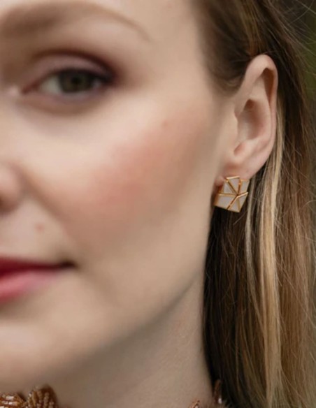 Earrings with geometric design and stones