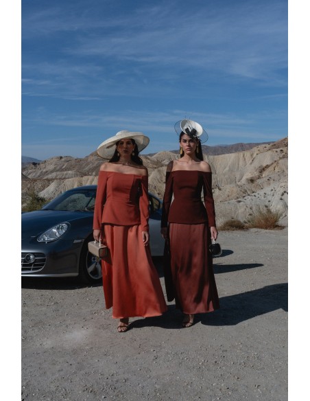 Guest outfit with peplum top and flared skirt